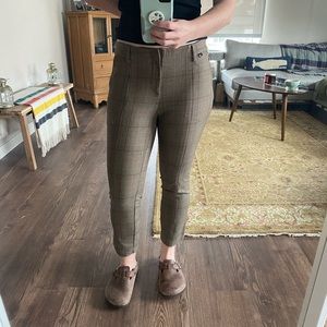 the essential slim pant in brown plaid by Anthropologie